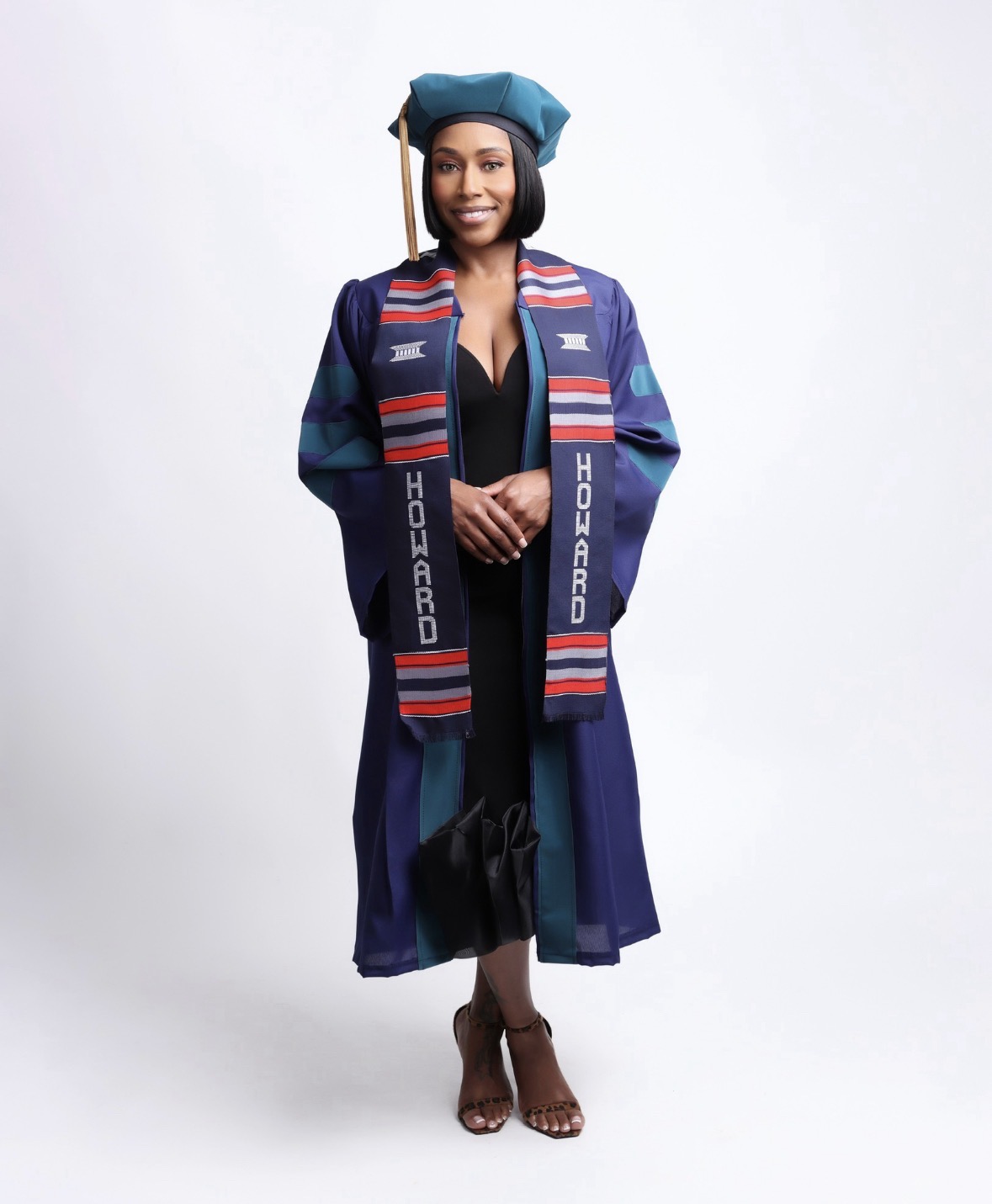 Jessica Smith, founder of CedarCrown Therapy, in doctoral graduation regalia